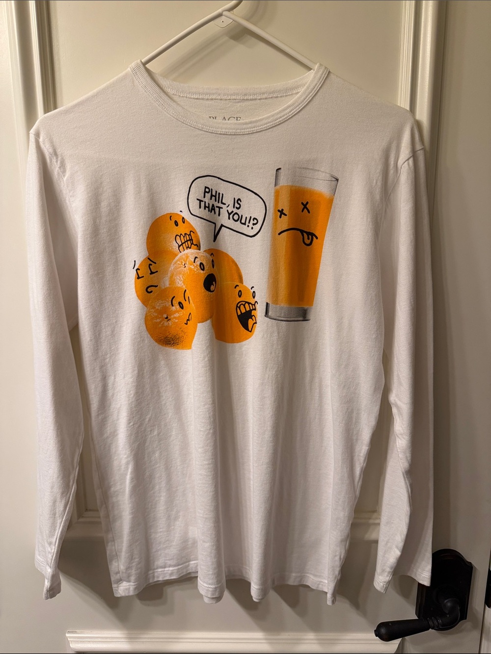 Place White Long Sleeve Tee with Orange Cartoon Graphic